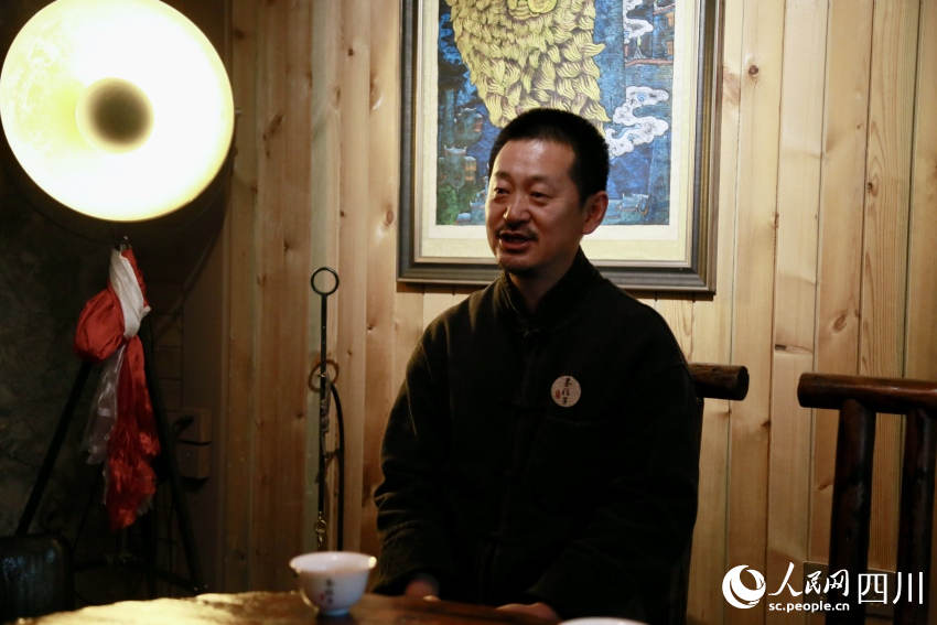 正在接受人民网记者采访的蒋维明。人民网记者 朱虹摄